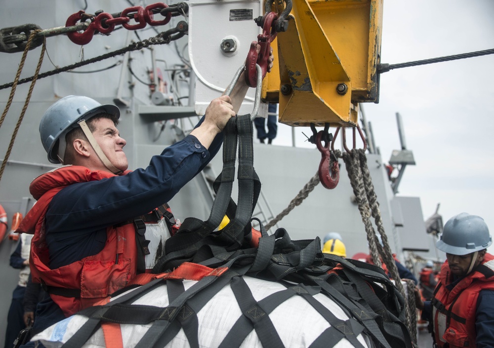 USS Sampson (DDG 102) conducts a replenishment at sea