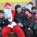 Santas surprise, celebrate Christmas with local kids