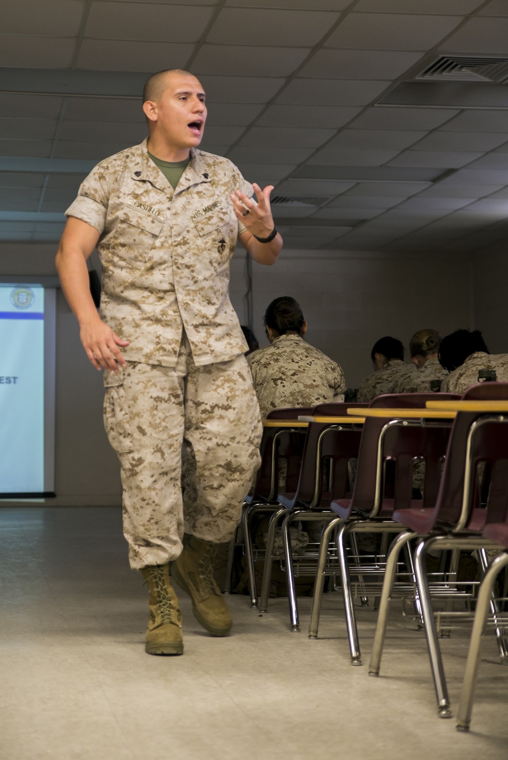 Marine recruits take notes during history class on Parris Island