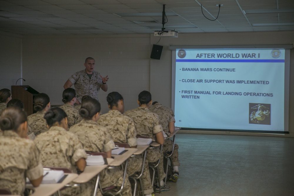 Marine recruits take notes during history class on Parris Island