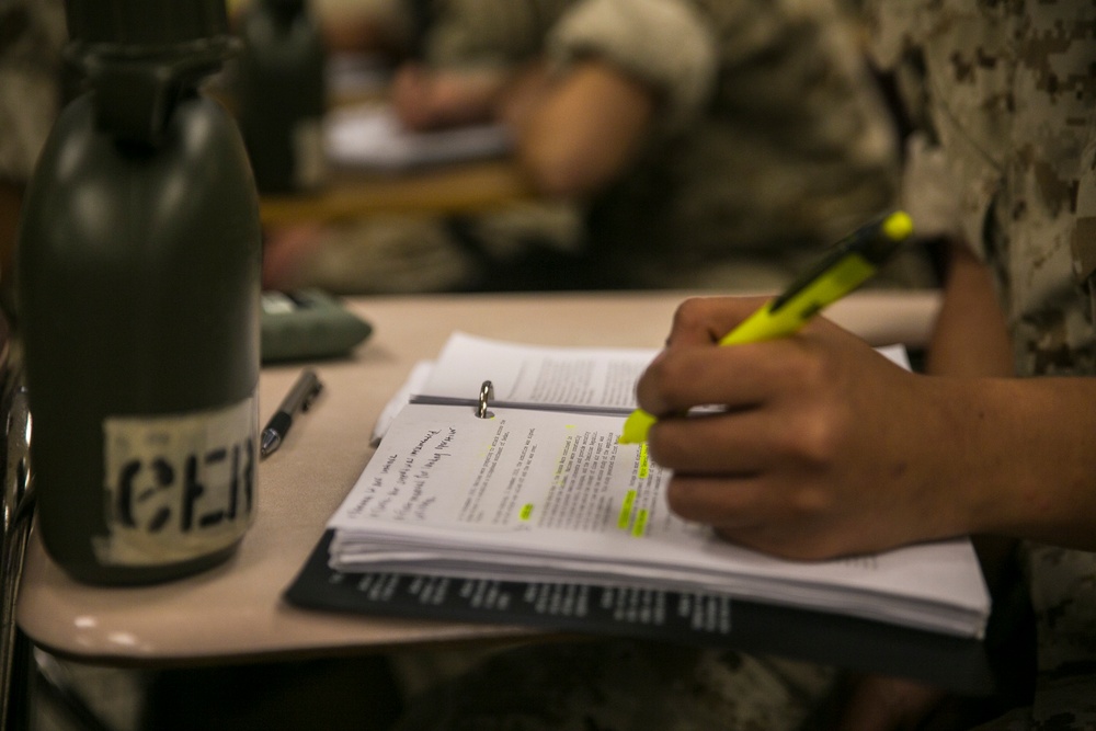 Marine recruits take notes during history class on Parris Island