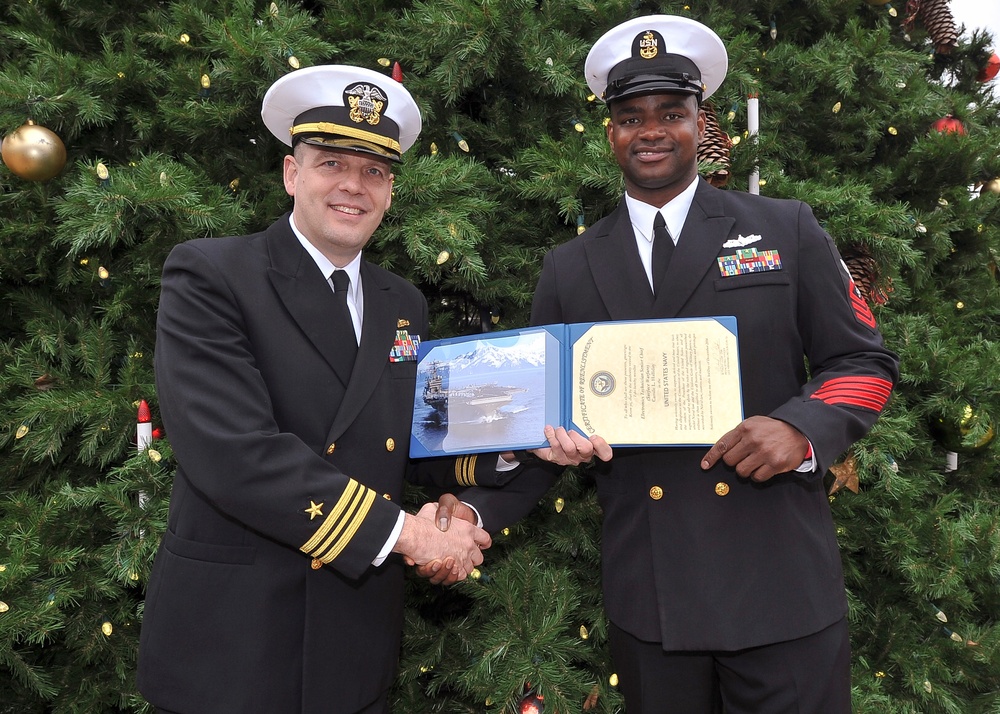 USS Abraham Lincoln Sailor re-enlists