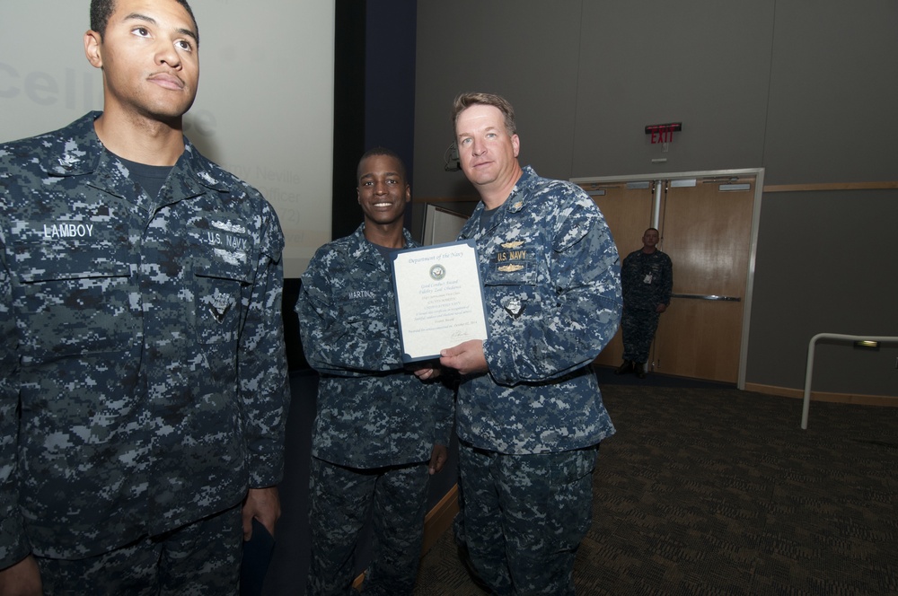 USS Abraham Lincoln Sailor is presented Good Conduct Medal