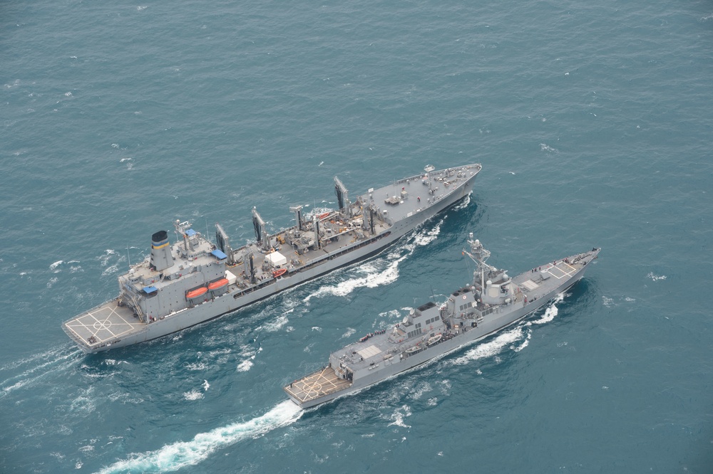 US Navy ships conduct replenishment-at-sea