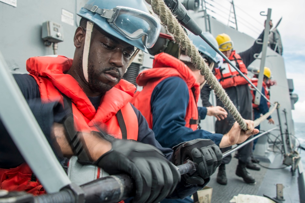 US Navy ships conduct replenishment-at-sea