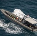 Navy divers conduct search operations in the Java Sea