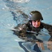 Candidates conduct water survival training