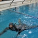 Candidates conduct water survival training