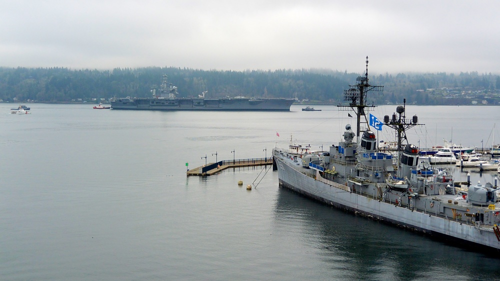 Coast Guard escorts USS Nimitz to new homeport