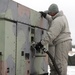 Soldier refuels a generator during WAREX 2015