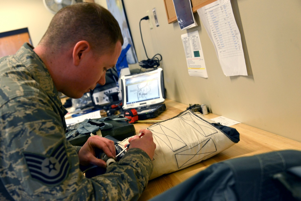144th AFE personnel conduct routine equipment inspections