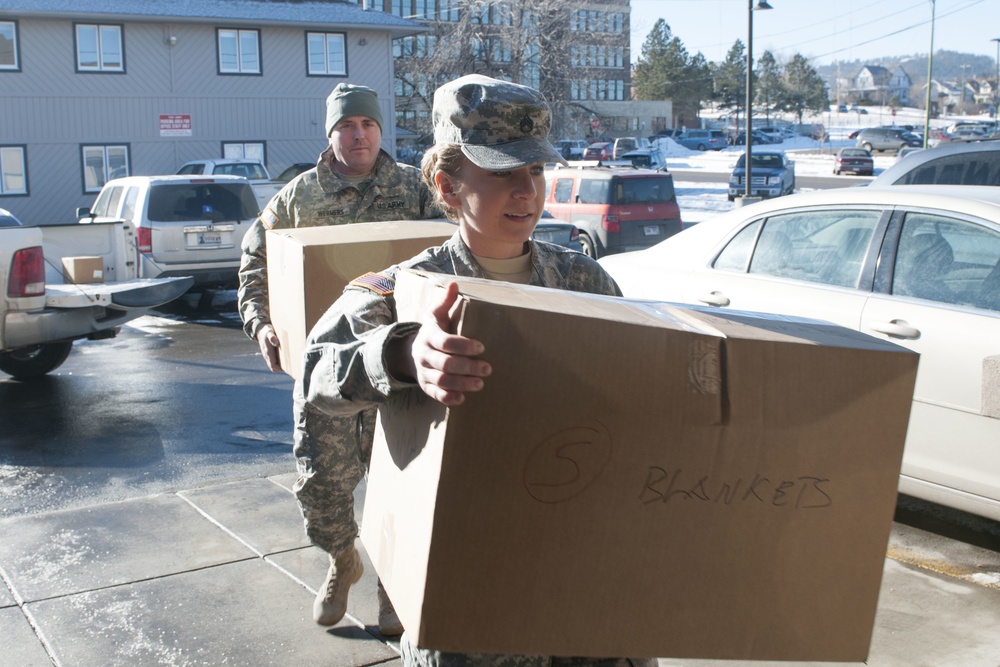 SD Guard delivers winter clothing to people in need