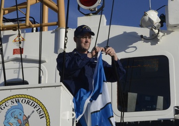 CGC Swordfish raises Seahawks flag