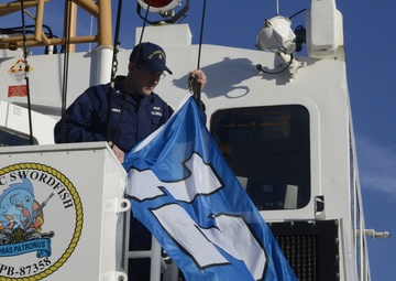 CGC Swordfish raises Seahawks flag
