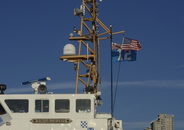 CGC Swordfish raises Seahawks flag