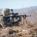 A United States Marine simulates fire