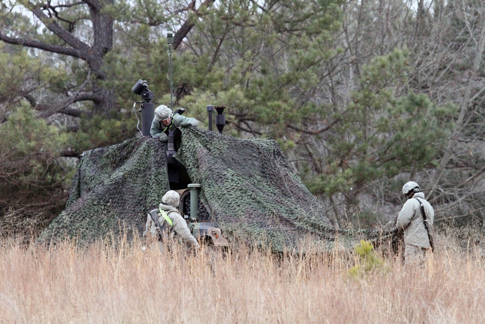 310th Chemical Company train in a cold-weather environment