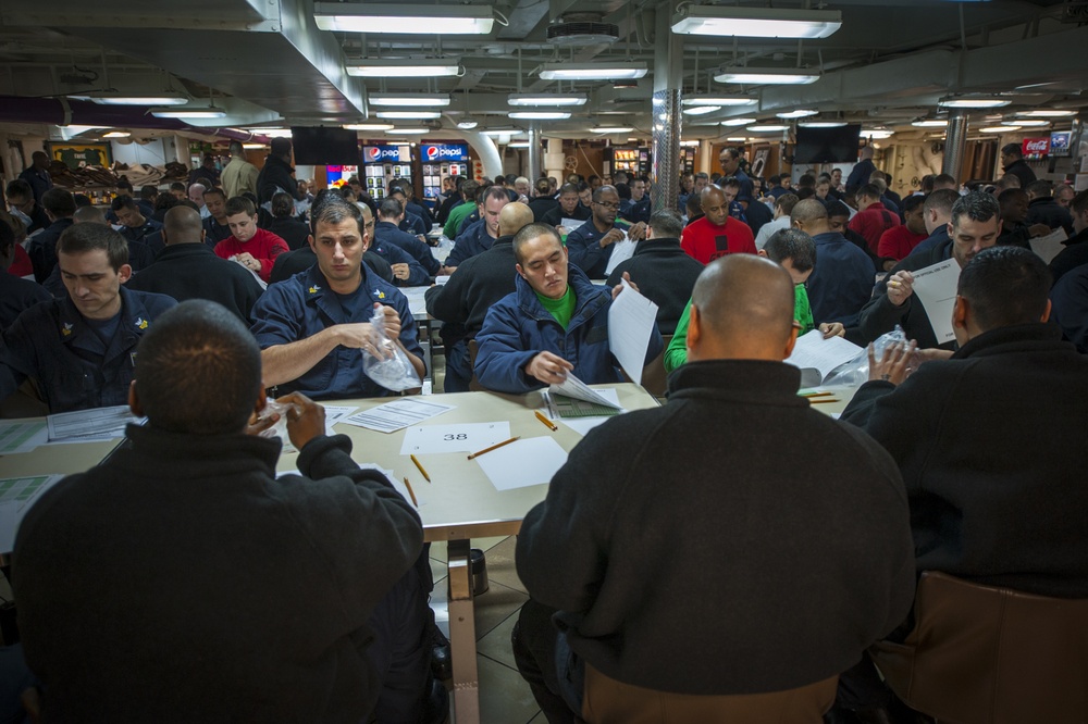 USS Carl Vinson Sailors take advancement exam