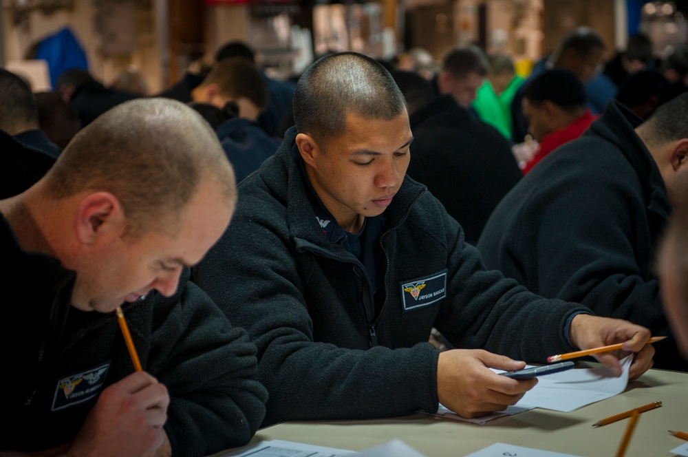 USS Carl Vinson Sailors take advancement exam