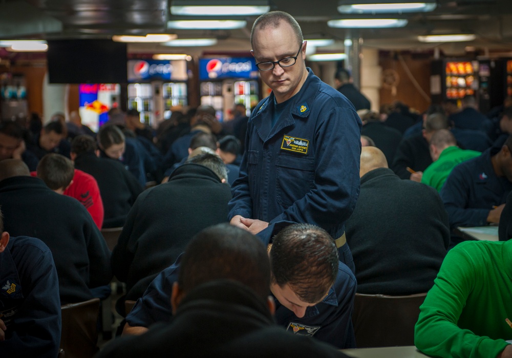 USS Carl Vinson Sailors take advancement exam