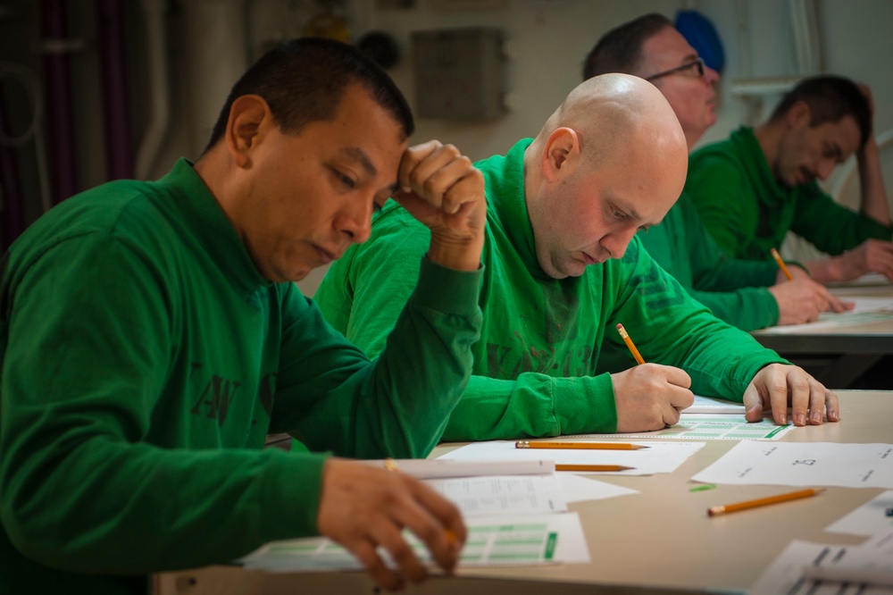 USS Carl Vinson Sailors take advancement exam