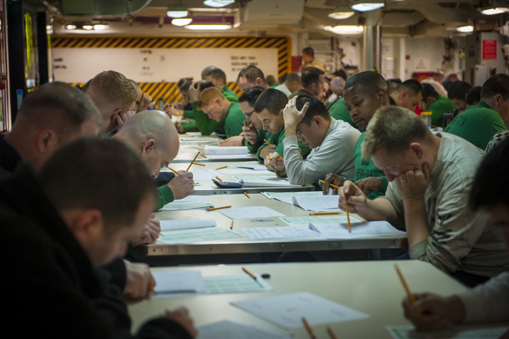 USS Carl Vinson Sailors take advancement exam