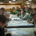 USS Carl Vinson Sailors take advancement exam