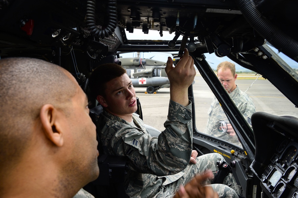 1-228th Aviation Regiment, 612th Air Base Squadron work together during crash rescue training