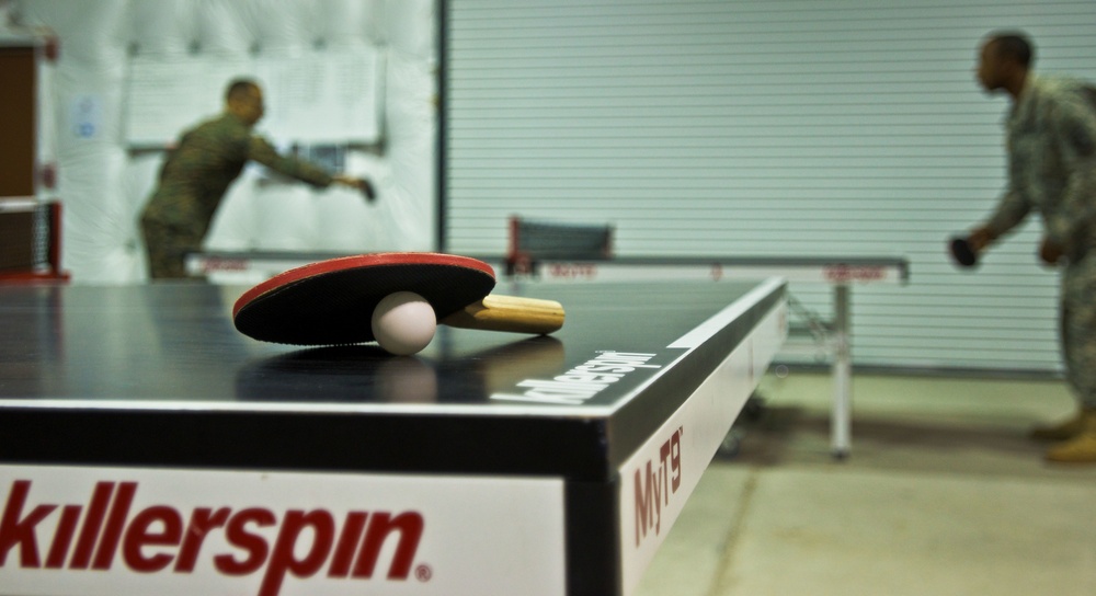 JFC-UA service members compete in a ping pong tournament