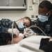 USS Harry S. Truman Sailor receives dental exam