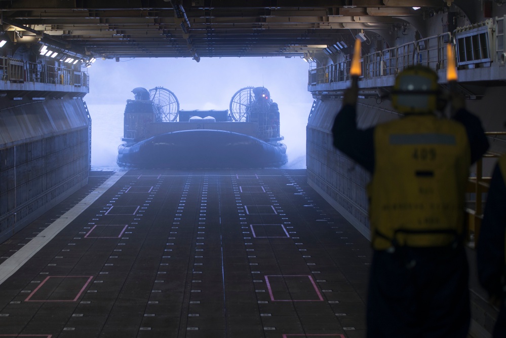 USS Bonhomme Richard: Sailors guide LCAC in Well Deck