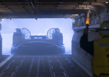 USS Bonhomme Richard: Sailors guide LCAC in Well Deck