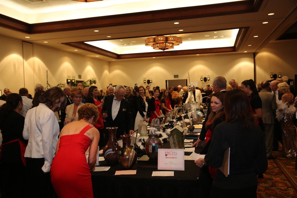 Combat Center Marines present flag during 3rd annual Hearts for Arts Gala