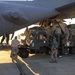 3rd APS Airmen load C-130