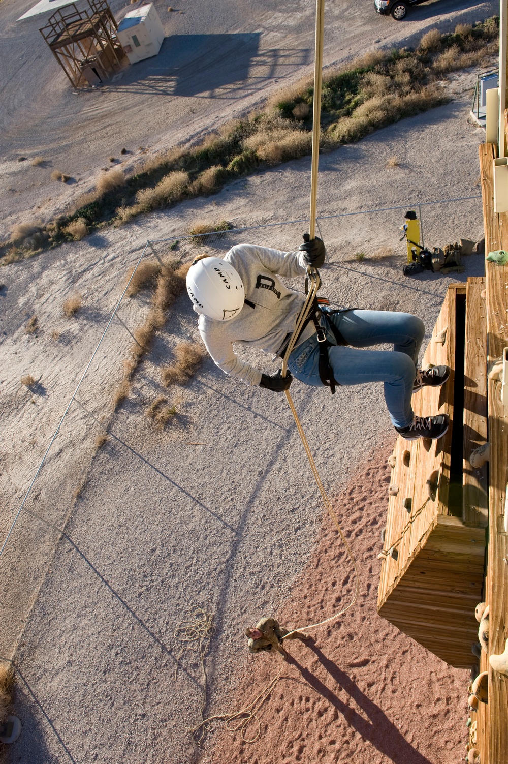 JROTC cadets rappel with 58th RQS during Nellis AFB tour