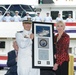 Cutter William Trump awarded plaque by sponsor