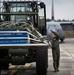 Airmen load Herc