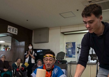 Marines pound rice, ring in the New Year with local friends