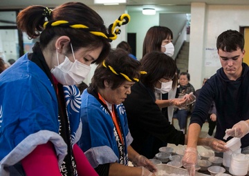 Marines pound rice, ring in the New Year with local friends