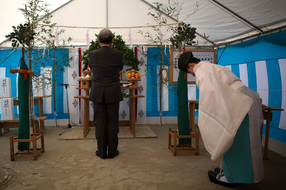 Shinto priest blesses new school construction grounds