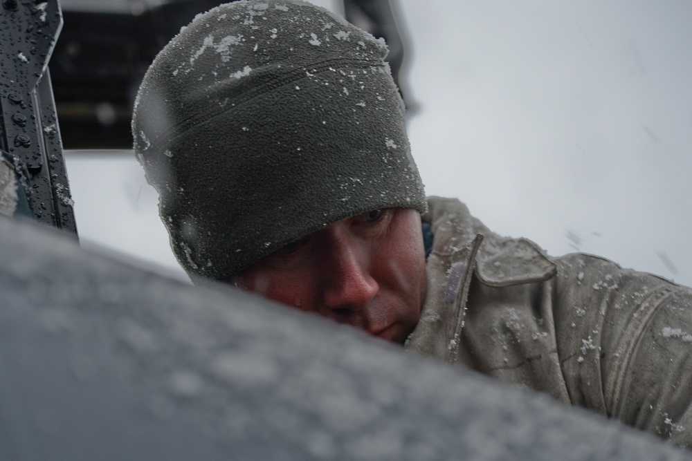 Snow falls on Liberty Wing