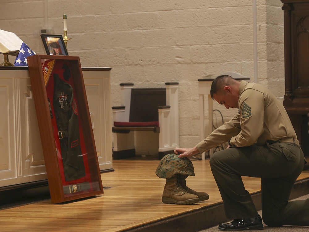 Marines pay respect to a fallen brother