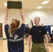 Female U.S. Marine Corps poolees endure DEP workout