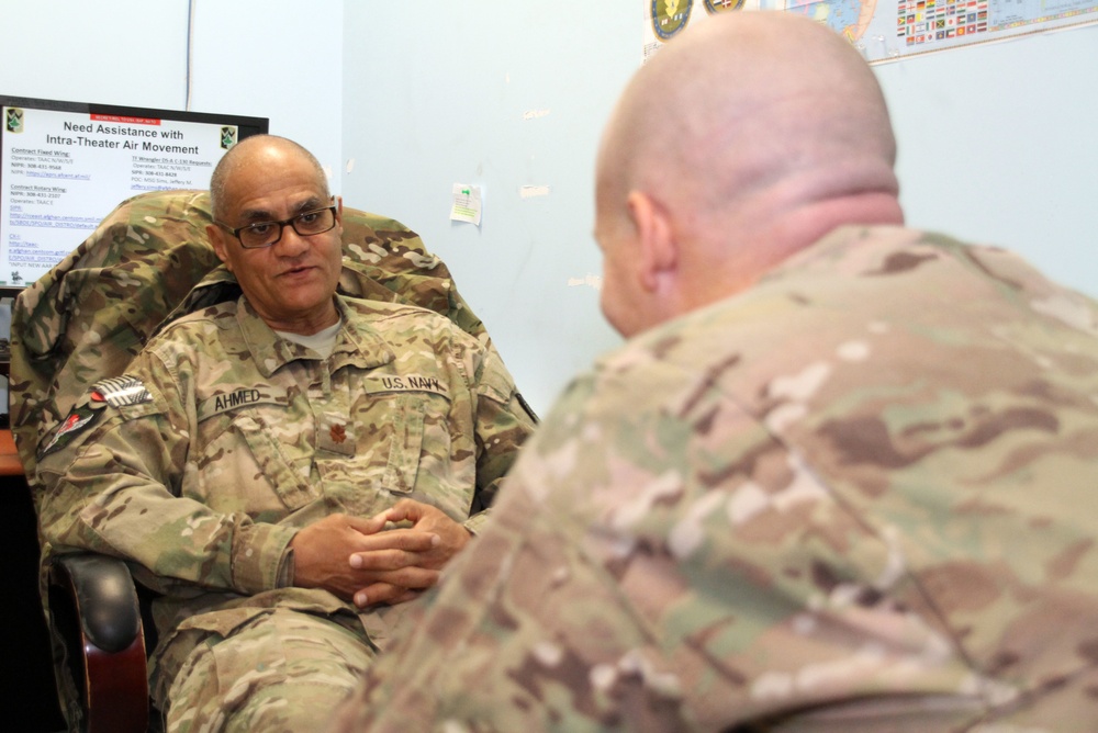 A psychiatrist speaks with a patient in Afghanistan