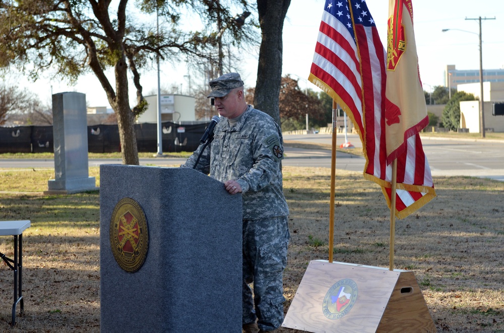 Community tree planting represents resiliency, strength