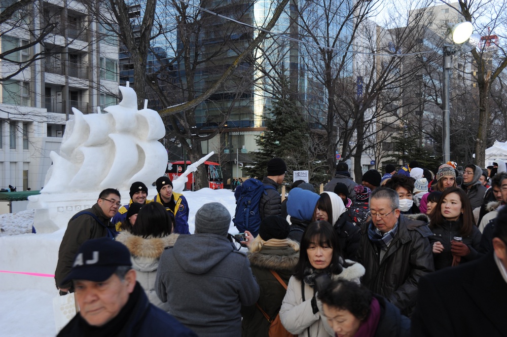 2015 Navy Misawa Snow Team creates USS Constitution snow sculpture during the 66th Annual Sapporo Snow Festival