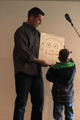 Chaplain builds bridges with smiles by children in need