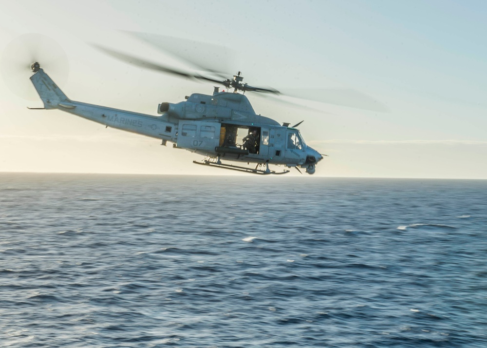 UH-1Y Venom helicopter departs USS Green Bay