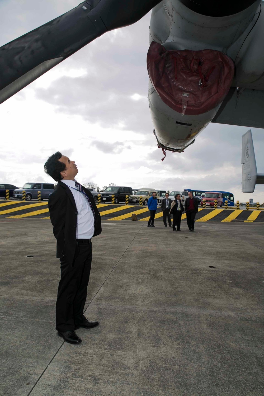 Japanese Observer Exchange Program members learn about unique abilities of Osprey