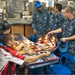 Supercross team members tour USS Peleliu